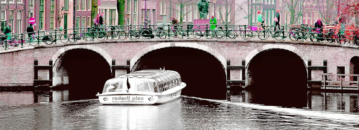 Glass-topped canal cruise boat passing gabled houses in Amsterdam — 1