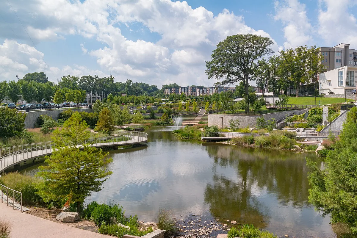 Families walking and biking the Atlanta BeltLine Eastside Trail past murals — 2