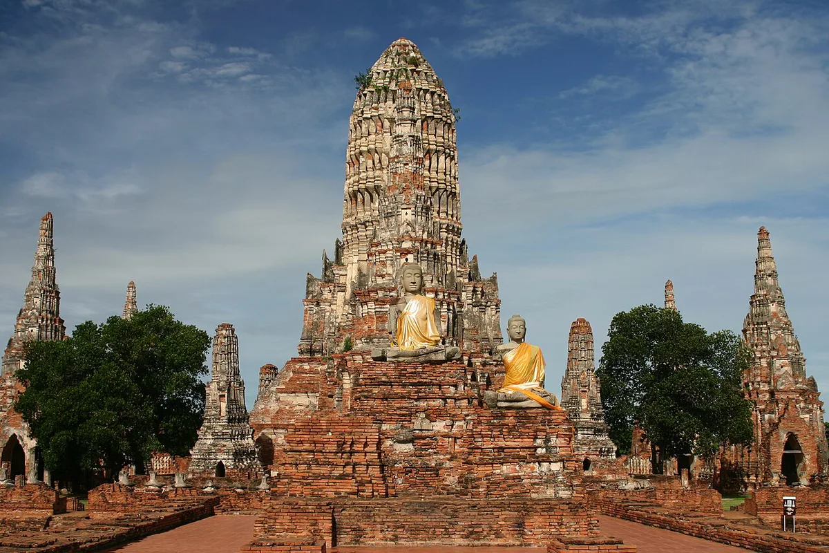 Buddha head entwined in tree roots at Wat Mahathat, Ayutthaya — 2