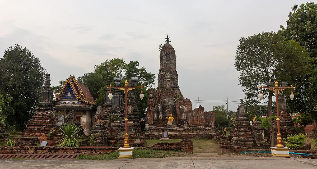 Buddha head entwined in tree roots at Wat Mahathat, Ayutthaya — 2