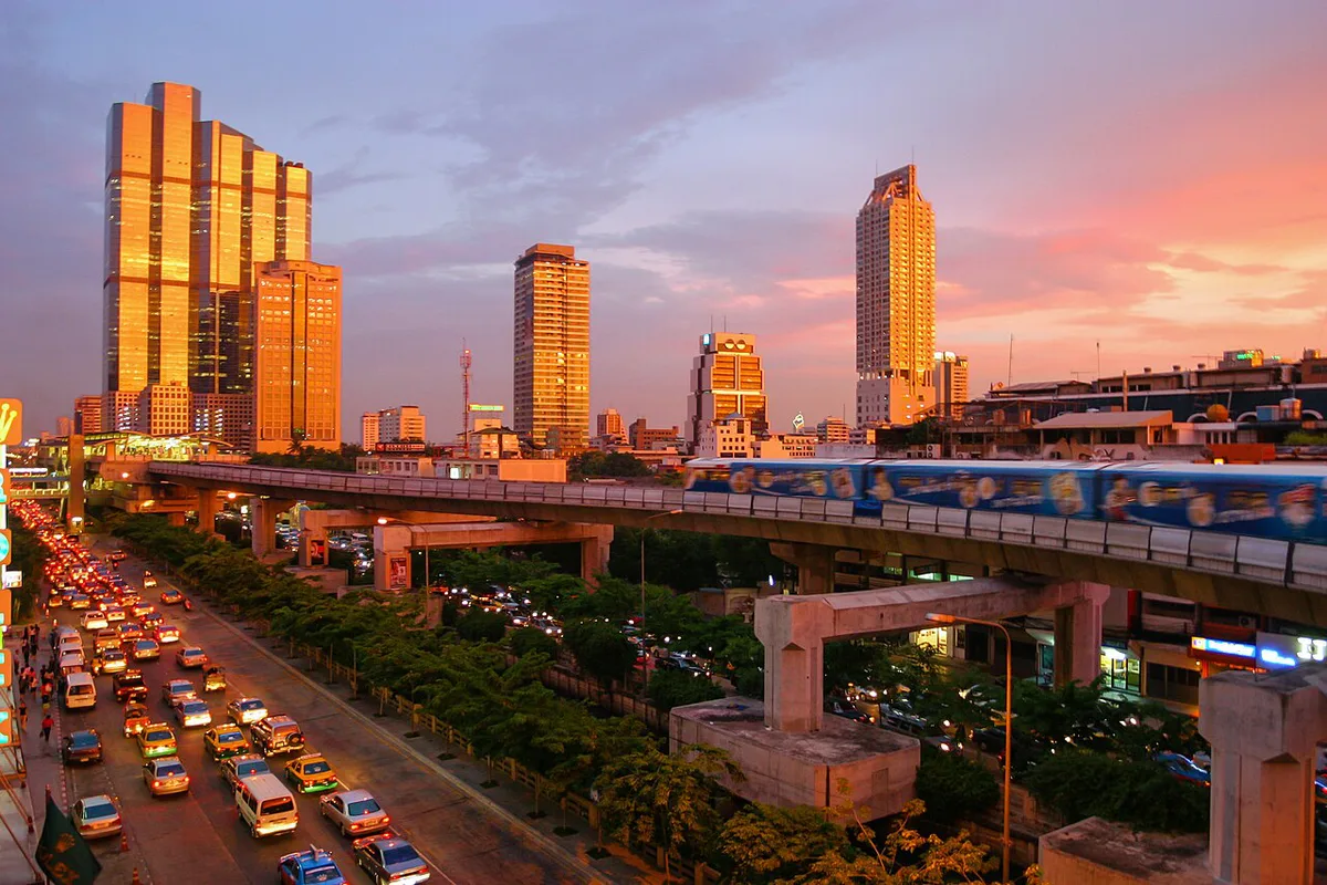 Orange-flag Chao Phraya Express boat on the river in Bangkok — 1
