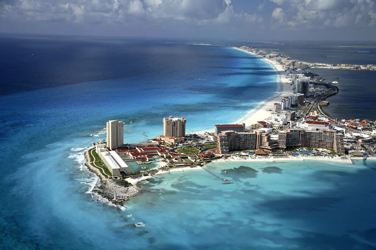 White sand beach and turquoise water along the Cancun Hotel Zone — 1