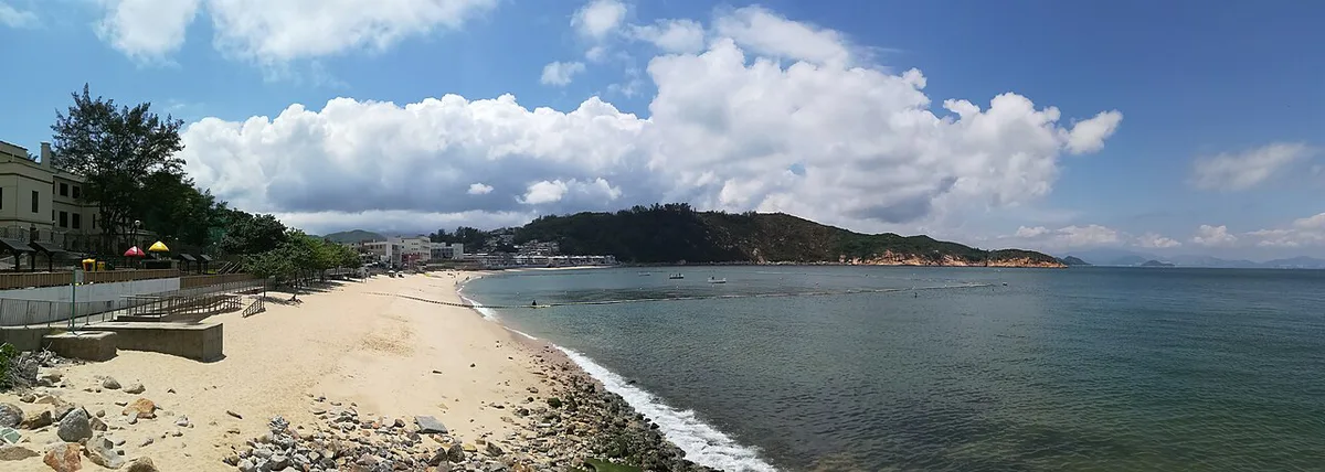 Fishing boats in Cheung Chau harbour with the village behind — 1
