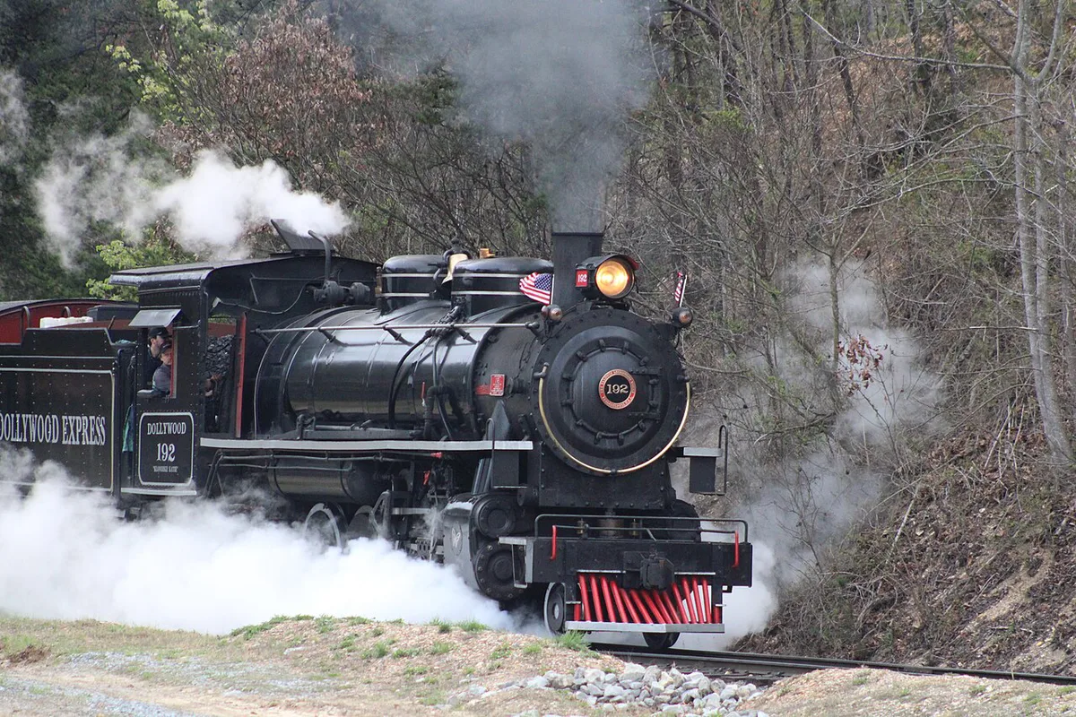 Wooden roller coaster winding through the trees at Dollywood — 2