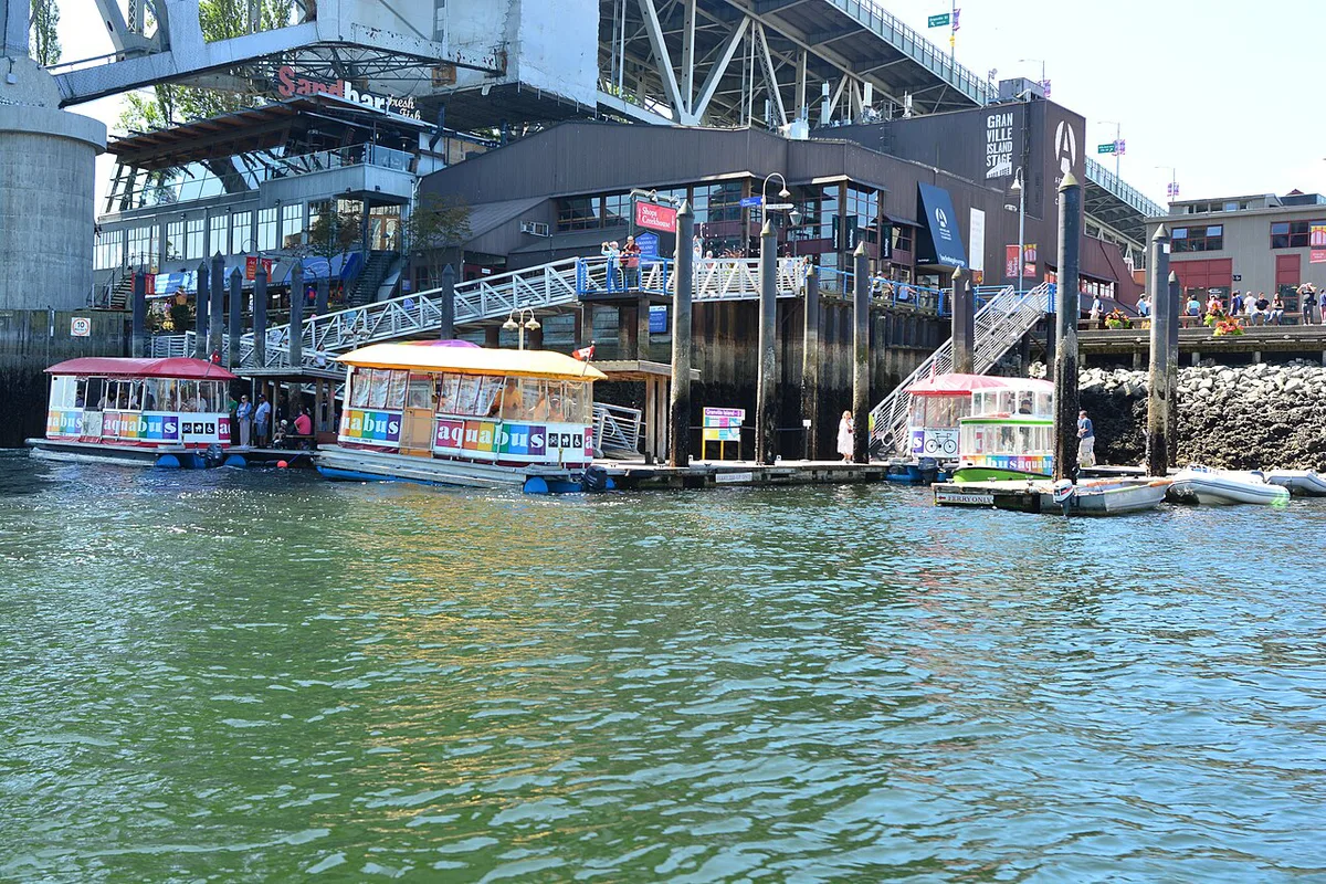 False Creek ferry approaching the Granville Island public market docks — 1