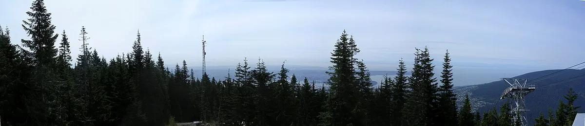 Grouse Mountain Skyride gondola climbing above North Vancouver forest — 2