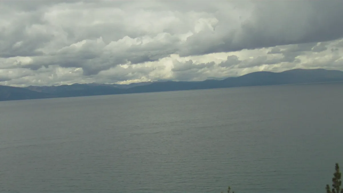 Ski slopes above the blue water of Lake Tahoe — 2