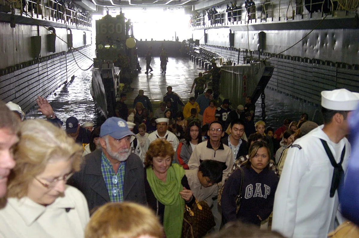 Grandparents and grandchildren together at a cruise ship railing — 1