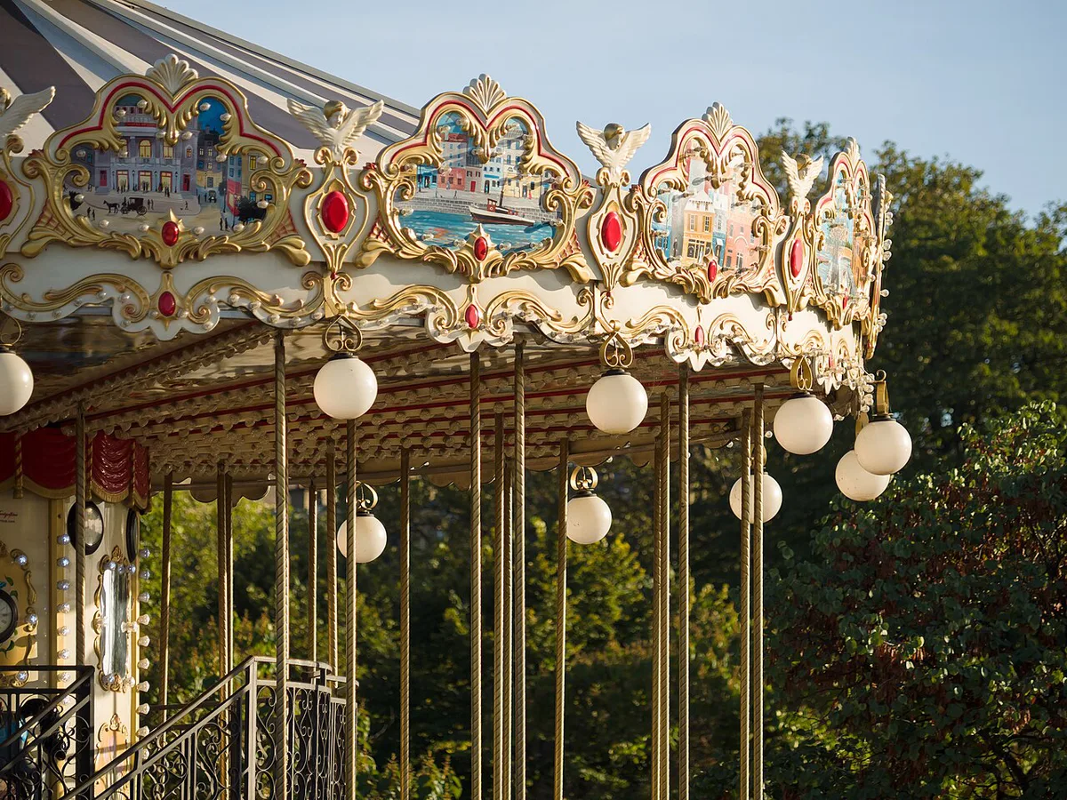 Classic Parisian carousel with the Eiffel Tower in the background — 1
