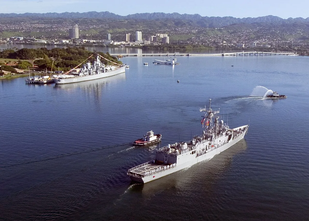 USS Arizona Memorial spanning the sunken battleship at Pearl Harbor — 1
