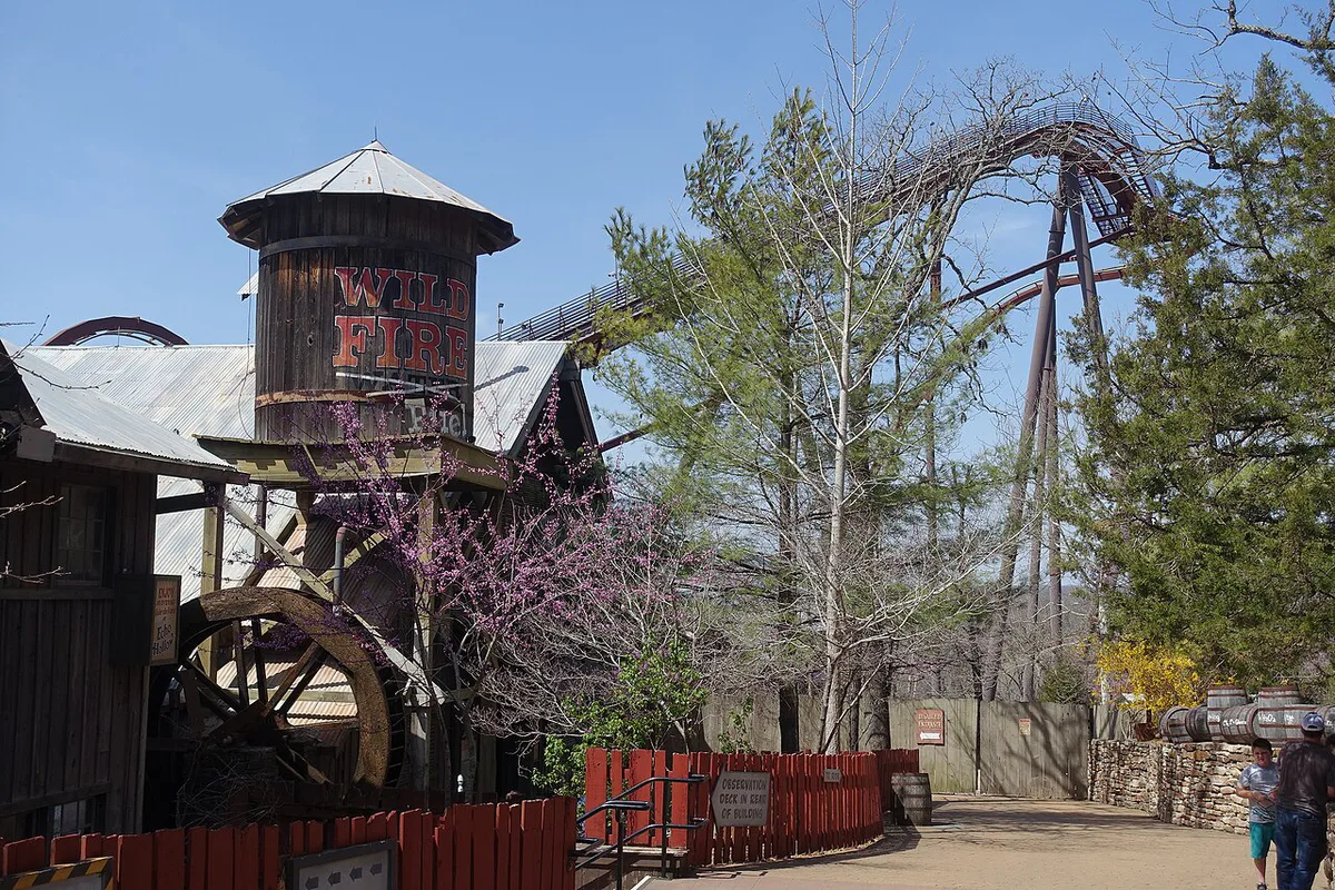 Vintage-style rides and 1880s buildings at Silver Dollar City theme park — 1