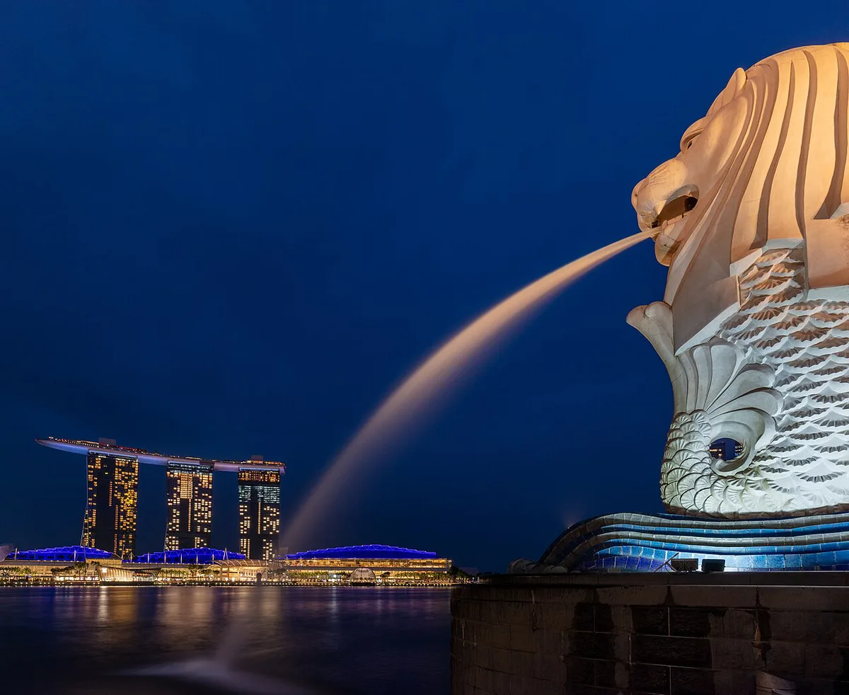 Supertree Grove at Gardens by the Bay with the Marina Bay Sands skyline behind — 2