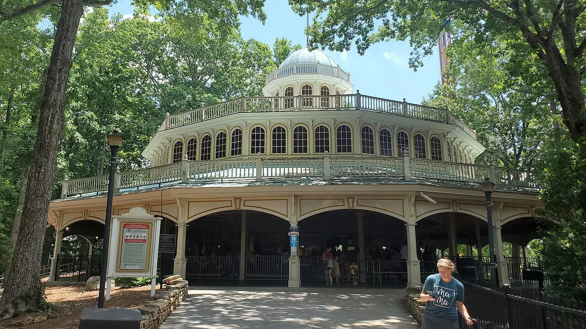 Families riding a classic coaster at Six Flags Over Georgia — 1