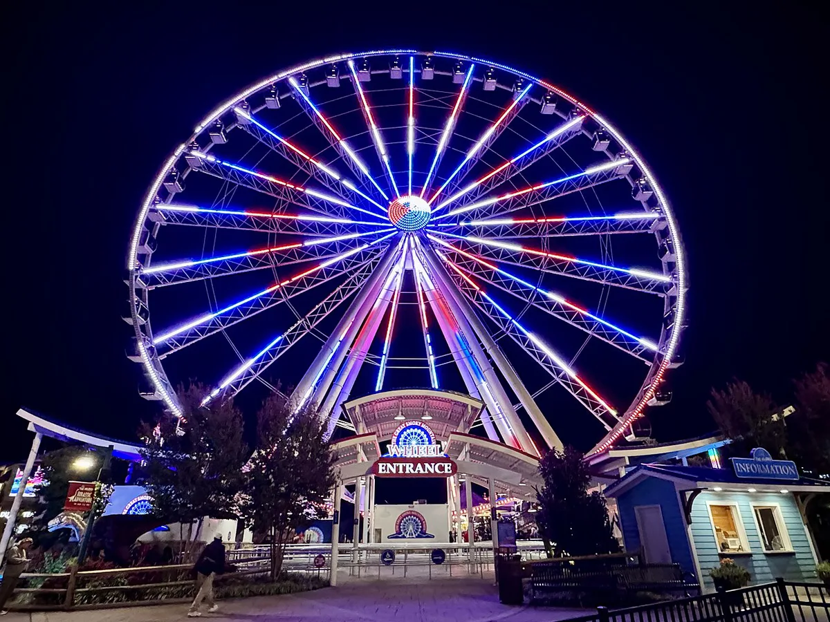 Great Smoky Mountain Wheel lit up at night at The Island in Pigeon Forge — 1